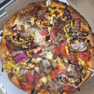 CLEVELAND pizza sauce, mozzarella, pepperoni, sausage, crumbled pork, red onion, banana pepper, ricotta, parmesan & oregano