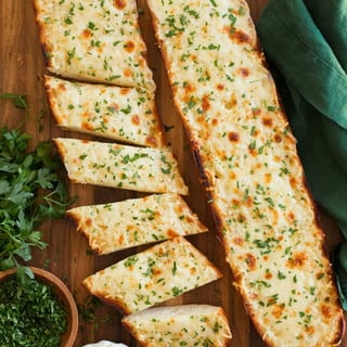 GARLIC BREAD our italian loaf with garlic butter & side of marinara